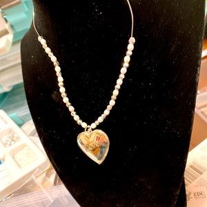 Hand made silver locket with silver and white beads